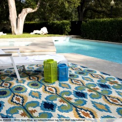 Spice up your backyard this summer with an outdoor rug